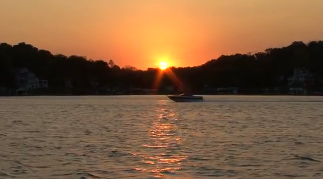 Apple Valley Lake Video Image of Boat and Sunset by Sam Miller
